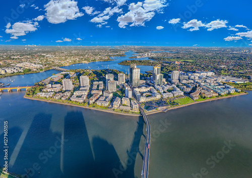 Panorama Aerial view above Rhodes with views to Meadowbank and Olympic park and Wentworth Point and Concord West with Parramatta River in Sydney NSW Australia