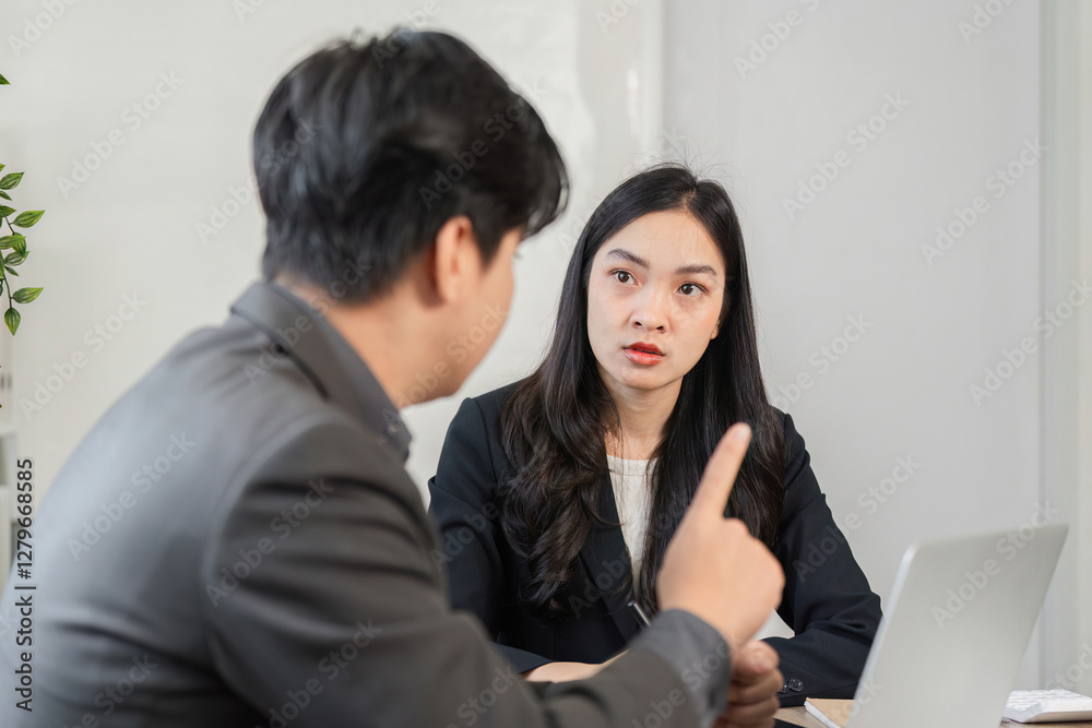 Colleagues analyzing financial data and reports in a collaborative meeting. Colleagues analyzing financial data and reports in a collaborative meeting.