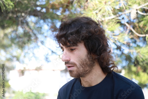 Sad Long Hair Man Is About To Cry From Depression In The Nature Park