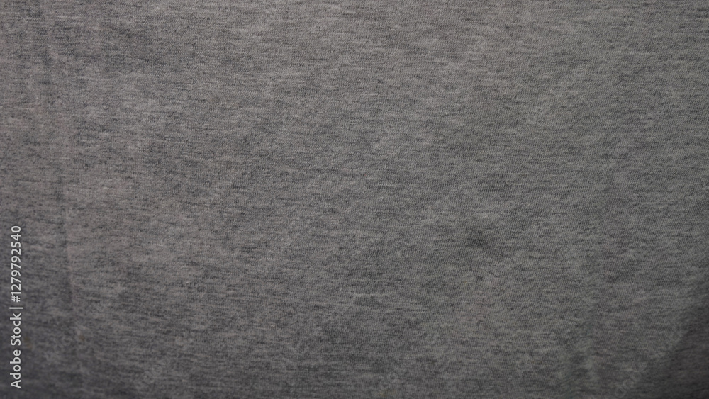 Close-up view of a textured gray fabric. Close-up view of a textured gray fabric.