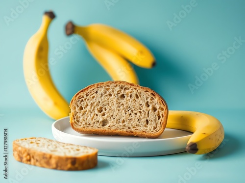 an image of a piece of bread and two bananas on a plate, there is a piece of bread and two bananas on a plate photo