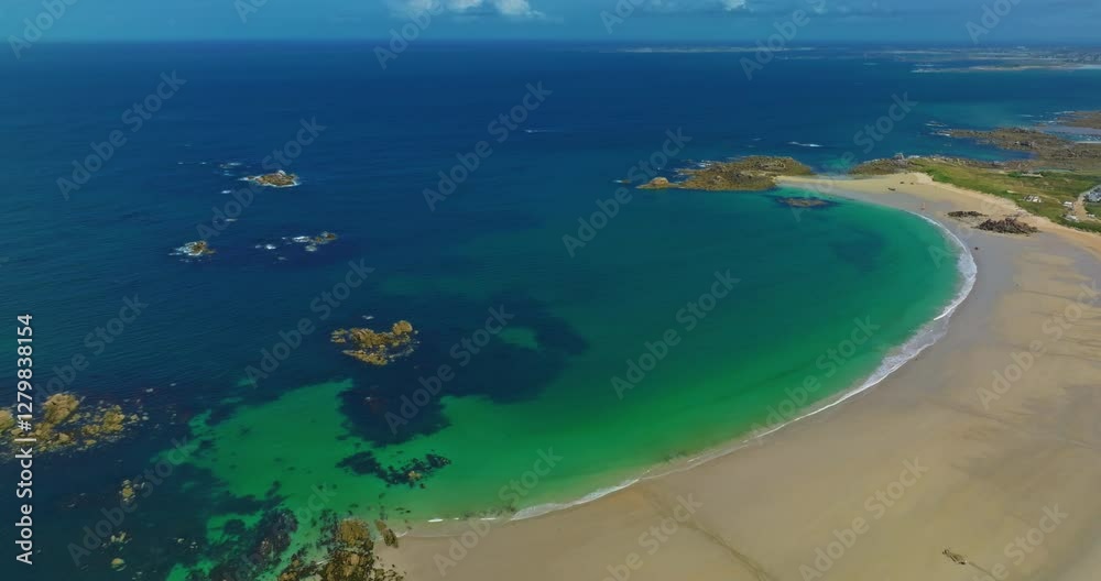 Aerial view of the tranquil beach at Plage des Amiets with clear turquoise water and waves Aerial view of the tranquil beach at Plage des Amiets with clear turquoise water and waves
