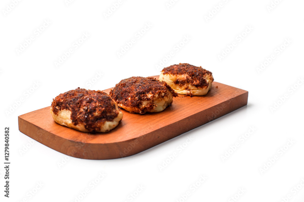 shredded bread on a wooden board