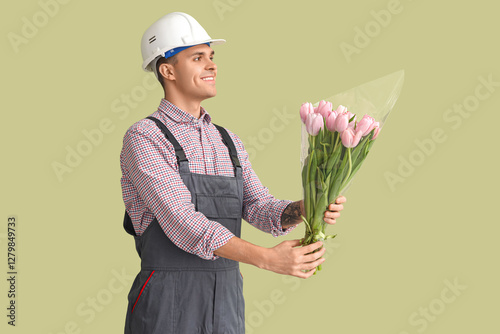 Male worker with tulips on ...