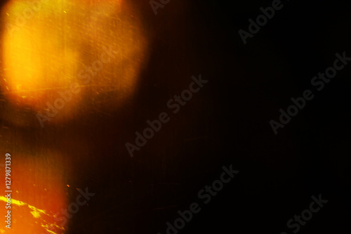 Designed film texture background with heavy grain, dust and a light leak