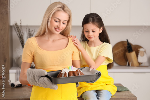 Cute girl and her mother ho...