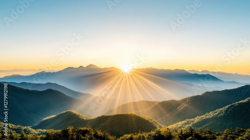 stunning sunrise over mountain range with misty layers