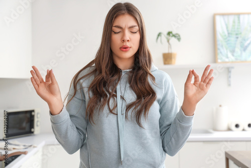 Young woman trying to calm ...