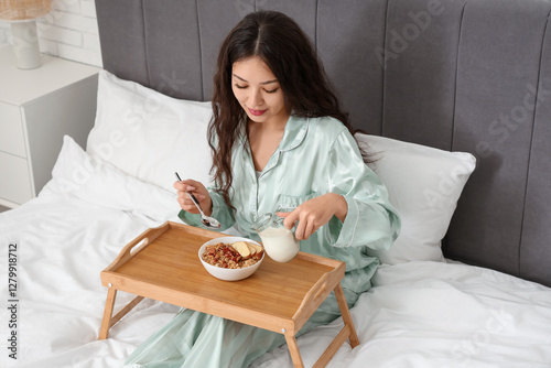 Morning of young Asian woma...
