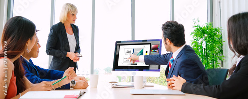 Graphic designer software for modern design of web page and commercial ads showing on the computer screen