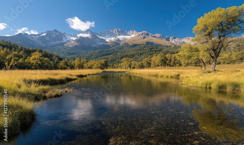 Serene Autumn River Reflecting Snow Capped Mountains