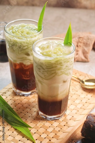 es Cendol  is a sweet ice dessert made from pandan short vermicelli with coconut milk, and palm sugar syrup.
