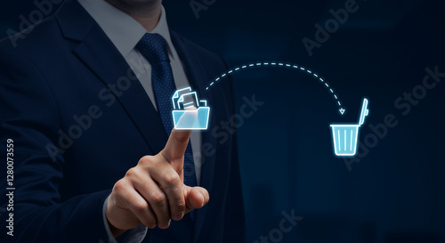 Businessman deleting files with a digital interface, represented by a Recycle Bin icon. A clean and efficient method for data management and file recycling.