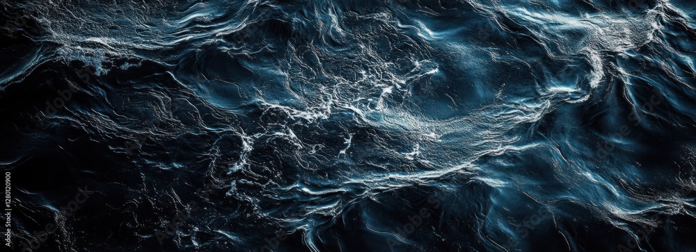 Obraz premium Abstract dark blue water texture with white highlights.