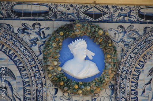 Azulejo tilework depicts a female figure surrounded by cherubs and a laurel wreath. This symbolizes Venus, the goddess of love and beauty. The tilework also represents the Portuguese Renaissance,