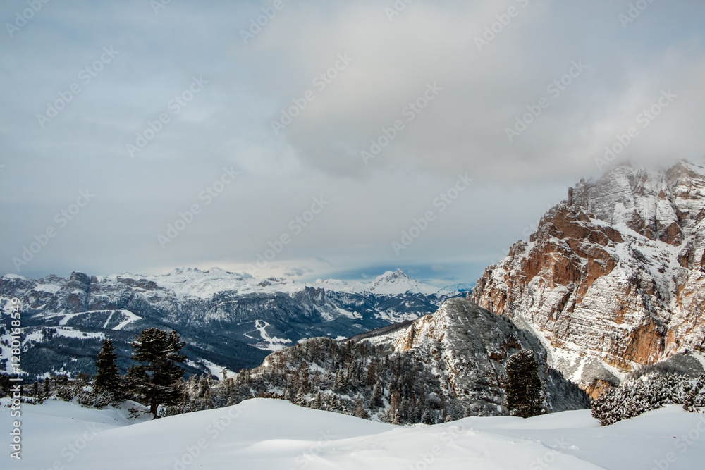 Stormy clouds in italian dolomites in a snowy winter
