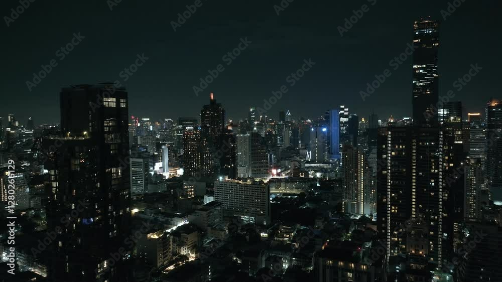 custom made wallpaper toronto digitalThis stunning drone footage captures the vibrant skyline of Bangkok, Thailand, at night. The city is illuminated by countless lights, showcasing towering skyscrapers and a mix of urban architecture.