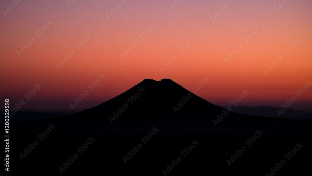 Dramatic Volcano Silhouette at Dusk Over a Vast Plain Dramatic Volcano Silhouette at Dusk Over a Vast Plain