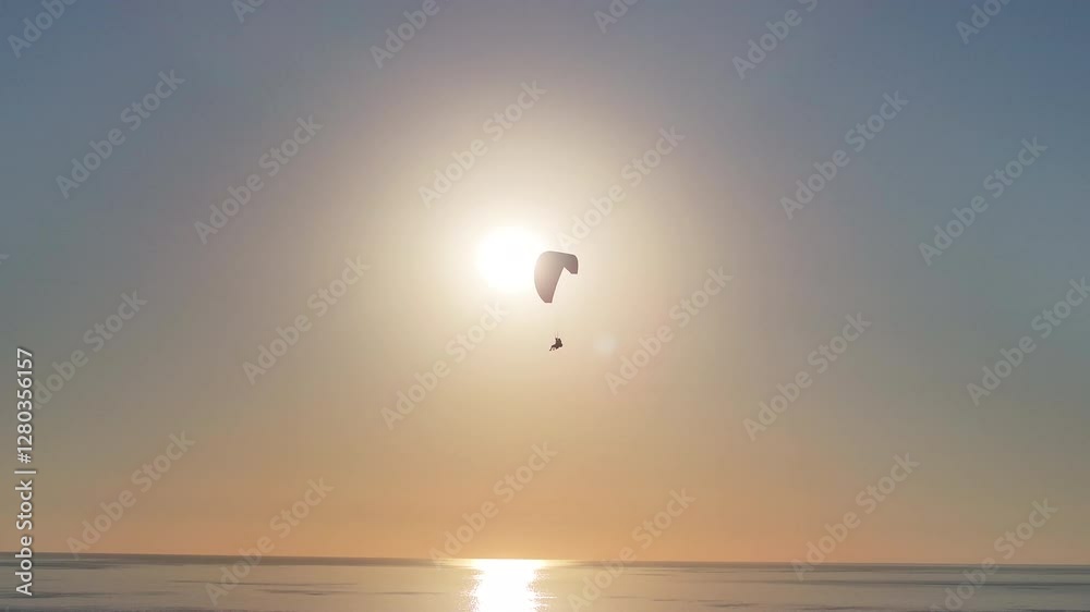 Paraglider flying above Alanya's coastline, Mediterranean Sea Paraglider flying above Alanya's coastline, Mediterranean Sea