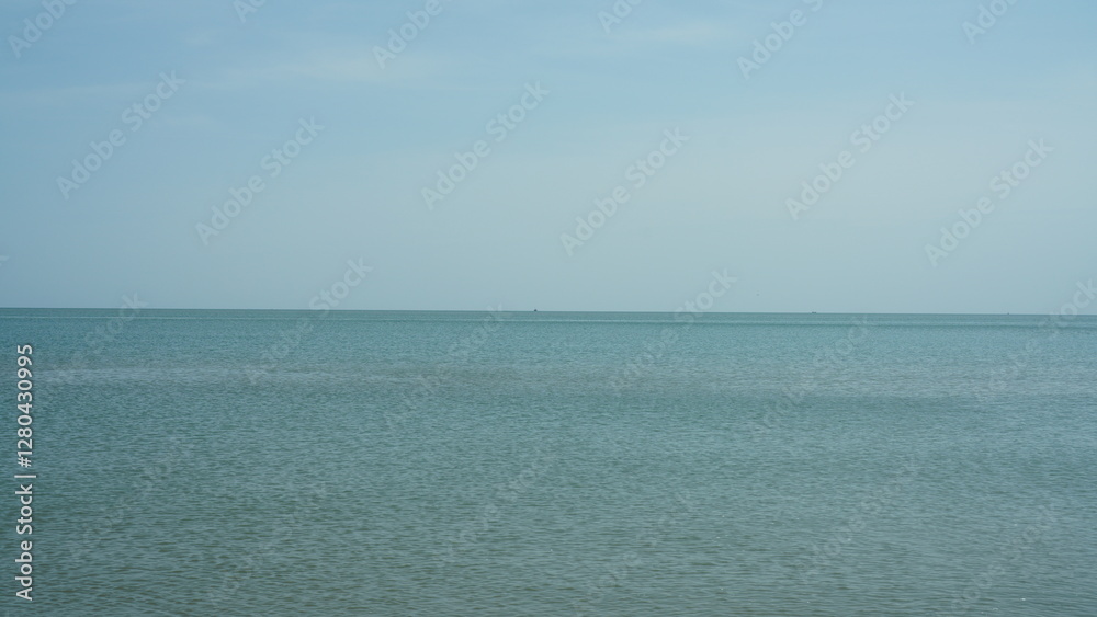 The peaceful sea view with the flat horizon line The peaceful sea view with the flat horizon line
