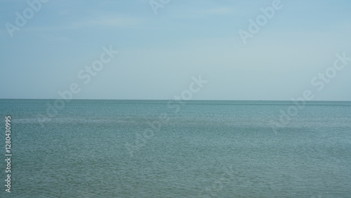 The peaceful sea view with the flat horizon line