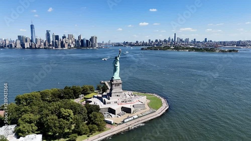 The Statue of Liberty with the New York and New Jersey downtown cityscape in the background. USA