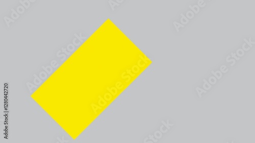yellow board on a gray background is turning and slowly getting bigger