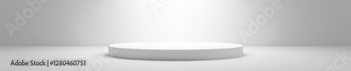 Gleaming white platform, sharply defined by spotlight, blank, sharp
