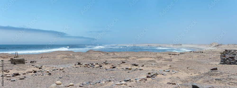 gravel beach at bay shore, near Toscanini old mining site, Skeleton coast, Namibia
