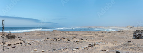 Obraz na płótnie gravel beach at bay shore, near Toscanini old mining site, Skeleton coast, Namibia w salonie