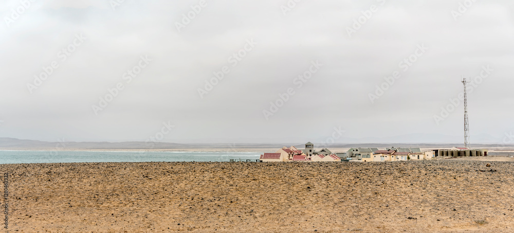touristic buildings on Ocean bay shore, Cape Cross, Namibia