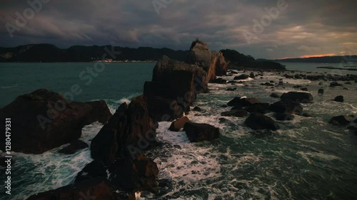 Drone View Of Hashigui iwa Rocks At Sunset, Wakayama Japan photo