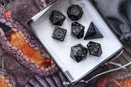 A set of dice for RPG, DND or board games. Polyhedral dice (d4, d6, d8, d10, d12 and d20) for fantasy games. Dice on a game map. photo