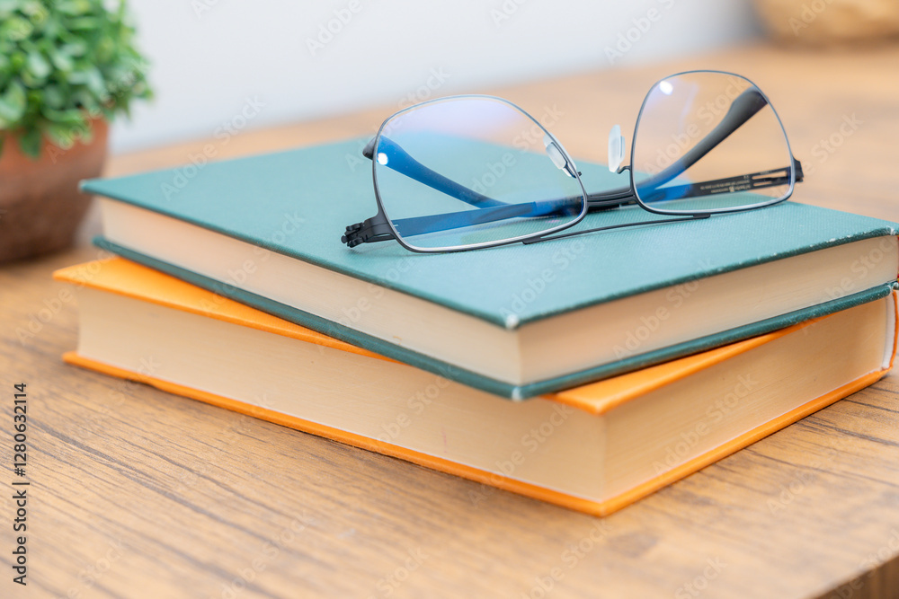 Glasses and books on the table Glasses and books on the table