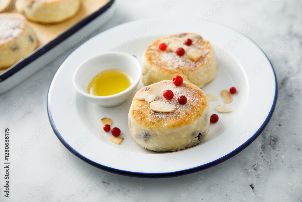 Homemade curd cakes with honey and almond Homemade curd cakes with honey and almond