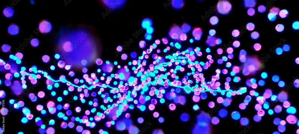 Vibrant neon particles surging through dynamic black background