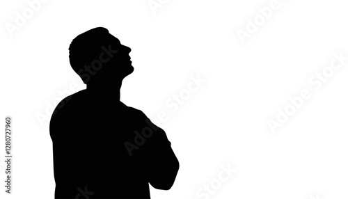 Silhouette of a man looking up against a white background