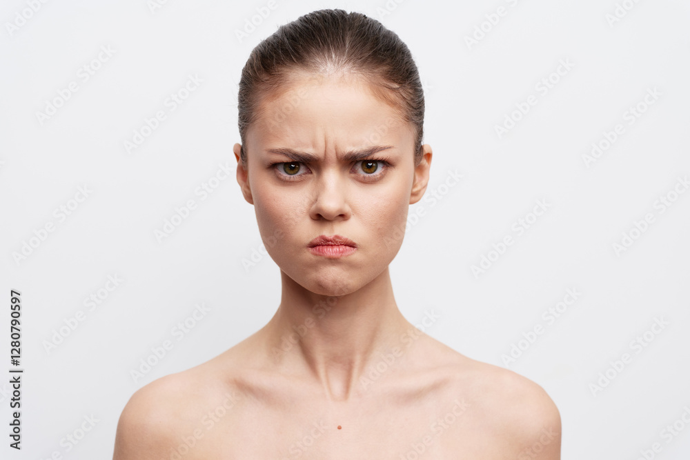 angry expression, serious face, emotion, portrait of a woman against a white background, simple and minimalistic design, capturing strong feelings and intensity angry expression, serious face, emotion, portrait of a woman against a white background, simple and minimalistic design, capturing strong feelings and intensity