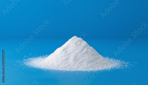 Heap of white titanium dioxide powder. Calcium carbonate, magnesium or zinc oxide. Close-up.