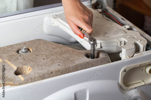 Twisting of the counterweight stone in the washing machine due to vibration and noise during the spin cycle, industry