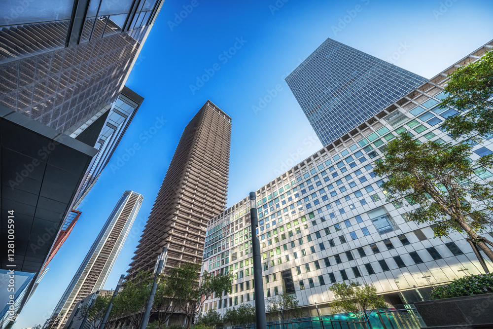 Glass High-Rises Towering Over Urban Public Space
