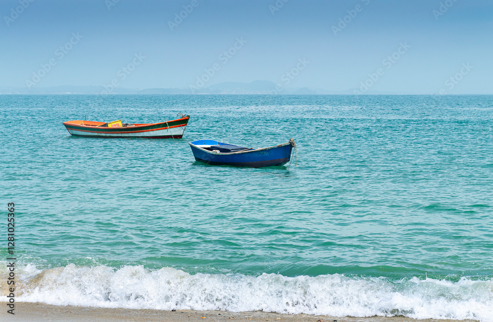 Fototapeta premium Two boats in the calm sea in Buzios