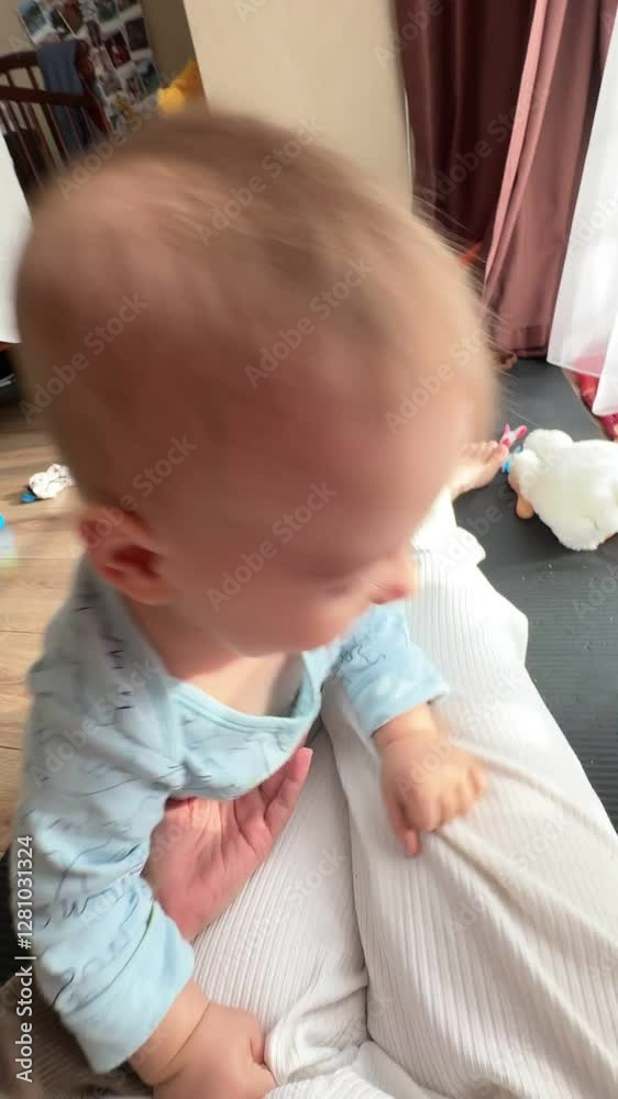 Baby in Pajamas with Toys in Background Baby in Pajamas with Toys in Background