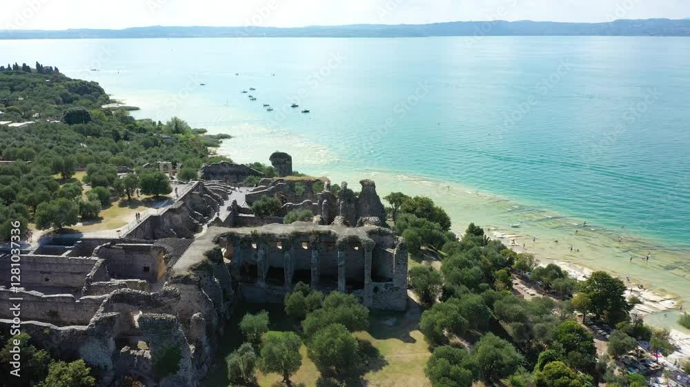 Grotto of Catullus Sirmione Lake of Garda Aerial Drone View. Archaeological site of Grotte di Catullo, Sirmione, Italy early morning aerial view. lake garda.