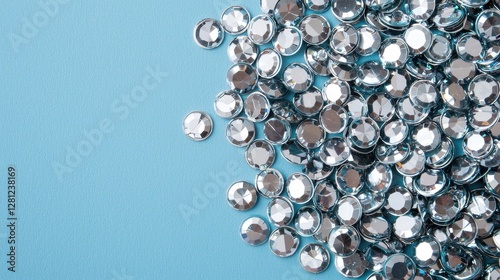 Sparkling Silver Rhinestones on Blue Background for Crafting Projects