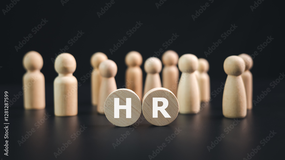 Hr, HRM, Human resources management recruitment concept, HR letters on a wooden plate with wooden dolls on a black background, Teamwork leadership concept, Recruitment and customer target group. Hr, HRM, Human resources management recruitment concept, HR letters on a wooden plate with wooden dolls on a black background, Teamwork leadership concept, Recruitment and customer target group.
