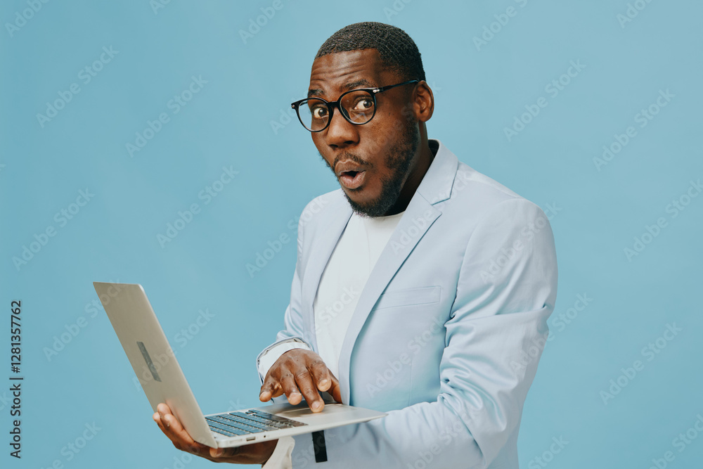 surprised man using laptop, casual business attire, light blue jacket, glasses, shock expression surprised man using laptop, casual business attire, light blue jacket, glasses, shock expression