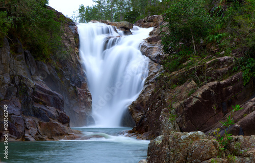 Fototapeta Naklejka Na Ścianę i Meble -  Motion blur of Big Rock Falls in Mountain Pine Ridge Forest Reserve, Belize