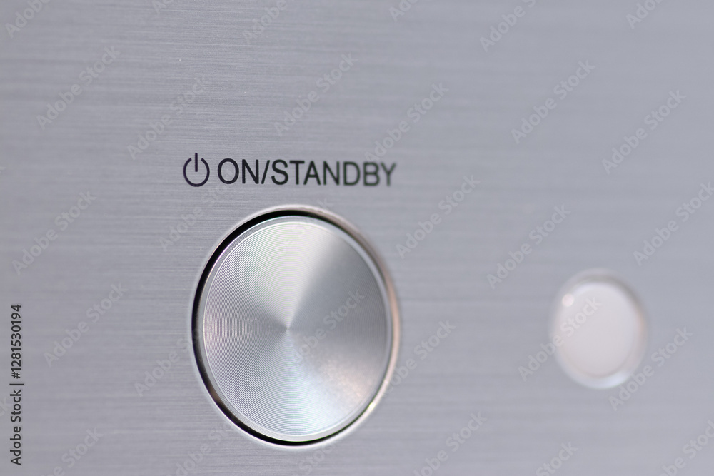 Closeup of a Metallic Power Button with On and Standby Label Closeup of a Metallic Power Button with On and Standby Label