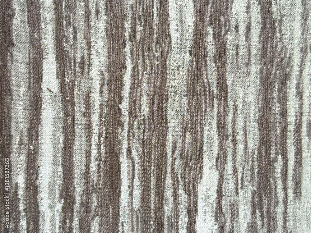 Fototapeta premium Close up of 3d textured bark sewn fabric with linear veins and grunge brown grey background. Seamless background texture